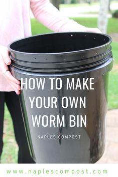 a woman holding a black trash can with the words how to make your own worm bin