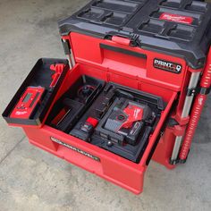 a red toolbox with tools in it