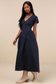 Contemporary style meets effortless ease in the Lulus Modern Concept Navy Short Sleeve V-Neck Midi Dress With Pockets! Slightly stretchy woven fabric shapes a relaxed-fit bodice with short dolman sleeves, bust darts, and a V-neckline. Waist boasts two flattering gathered panels (with hidden side seam pockets) at either side, creating a chic sense of volume as it falls to a midi hem. Hidden zipper/clasp at back. Fit: This garment fits true to size. Length: Mid-calf length. Size medium measures 52 Relaxed Fit V-neck Maxi Dress, V-neck Relaxed Fit Maxi Dress For Work, Relaxed Fit V-neck Maxi Dress For Work, Relaxed Fit Solid Color V-neck Maxi Dress, V-neck Maxi Dress With Pleated Waist For Work, Casual Short Sleeve V-neck Dress For Work, Relaxed Fit V-neck Dress For Work, Spring V-neck Dress With Short Sleeves For Work, V-neck Pleated Waist Daywear Maxi Dress