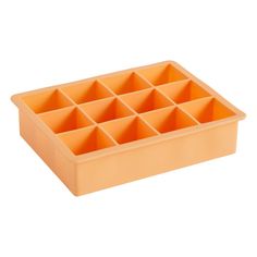 an orange plastic container filled with compartments