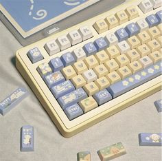 a computer keyboard sitting on top of a table