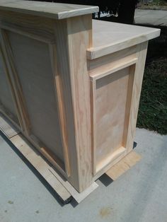 the unfinished cabinet is ready to be assembled and put into its place in the garage