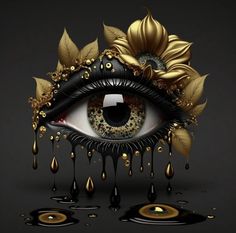 an eye with gold leaves on it and drops of liquid coming out of the iris