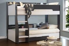 the bunk bed is made up and ready to be used as a child's room