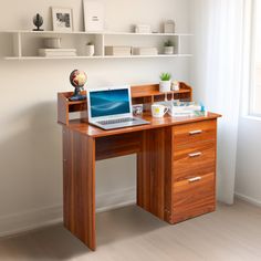 a laptop computer sitting on top of a wooden desk in front of a window with white shelves