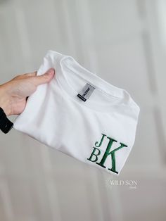 Personalize these tee's with your little ones initials. Choose from several different monogram designs! Made on a Gildan Youth t-shirt 50/50 cotton/polyester. If interested in a custom order or design please message us and we will be happy to help! Because these are one of a kind, returns are not accepted. Each item is made to order. We are unable to replace/refund purchases based on color and font selections, so please make sure to be very specific and make the correct selections when ordering. Alphabet Shirt, Monogram T Shirts, Name Embroidery, Monogram Design, Tshirt Design, Kids Tops, 50 50, Custom Name, Kids Shirts