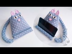 a cell phone holder made to look like a cat