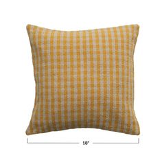 the yellow and white checkered pillow is shown with measurements for each pillow, which has a