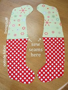 a pair of red and white polka dot stockings sitting on top of a wooden floor