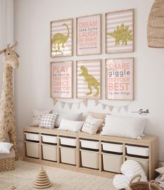 a child's room with pink and gold wall art, stuffed giraffes, storage bins and baskets