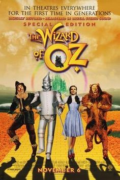 the wizard of oz movie poster with three people in costume and one man dressed as an animal