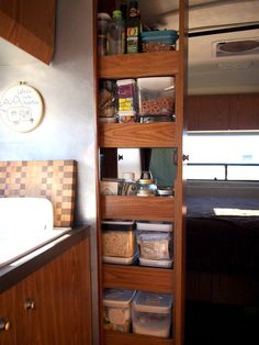 the kitchen is organized and ready to be used as a storage area for food items