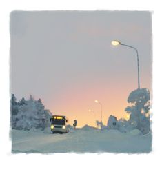 a bus is driving down the road in the snow at dusk with its headlights on