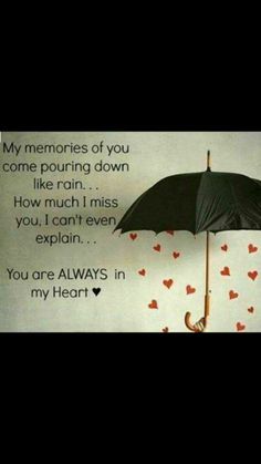 an umbrella with hearts hanging from it and the words, my memories of you come pouring down like rain how much i miss you can't even explain