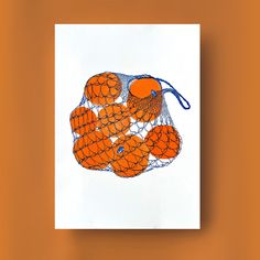 oranges are in a mesh bag on an orange background with blue string around them