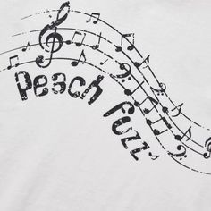 a white t - shirt with musical notes printed on it