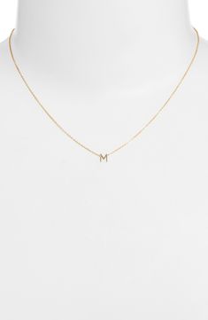 Personalize your stack with this layering-friendly necklace centered with a dainty pendant of your favorite initial filled with 14-karat yellow gold. 16" length 14k-gold fill Made in the USA Initial Pendant Necklace Gold, Initial M, M Necklace, Dainty Initial Necklace, Dainty Pendant, Initial Pendant Necklace, Initial Pendant, Gold Pendant Necklace, Initial Necklace