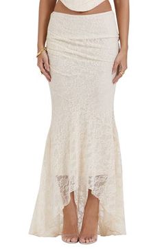 An elegant asymmetric skirt cut from vintage stretch lace with a swirl of floral patterns creates a dreamy look perfect for evenings out. The sheer silhouette comes with tonal briefs and a separate satin slip for your preferred coverage. Exclusive retailer Lined 92% polyester, 8% elastane Dry clean Imported Cream Skirt Outfit, Amsterdam Outfits, Lace Maxi Skirt, Thrift Inspo, White Lace Skirt, Maxi Lace Skirt, Duchess Satin, House Of Cb, Slip Skirt