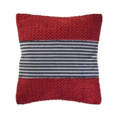 a red and grey striped pillow on a white background