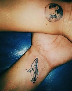 two small tattoos on their wrist