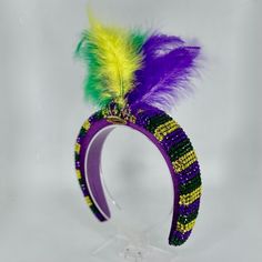 Unleash your inner carnival queen as this sparkly headpiece has you crowned as the Queen of Mardi Gras! Laissez les bon temps rouler *Locally hand made in New Orleans. Headpieces usually ship within 3-5 business days. Please be aware that due to the unique and handmade nature of each product, color, shapes, and sizes may vary slightly from the photo and descriptions. Whimsical Adjustable Headband For Party, Adjustable Party Hair Accessories With Matching Headband, Adjustable Headband Headpieces For Costume Party, Round Crown Headpiece For Carnival Costume Party, Adjustable Carnival Headpieces For Costume Party, Adjustable Multicolor Fascinator For Carnival, Adjustable Costume Accessories For Mardi Gras, Adjustable Carnival Costume Party Headpieces, Handmade Adjustable Costume Hats And Headpieces For Parties