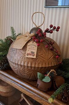 a display case filled with christmas decorations on top of a wooden table