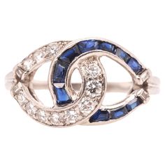 Year: 1950s Item Details: Ring Size: 7.25 Metal Type: Platinum [Hallmarked, and Tested] Weight: 6.1 grams Diamond Details: .30ct total weight, natural diamonds, E-F Color, VS Clarity, Transitional Round Cut & Straight Baguette Cut Sapphire Details: Natural, Blue, Baguette Cut, .40ct total weight. Band Width: 1.6 mm Condition: Excellent Sapphire Cocktail Ring, Vintage Sapphire, Fun Jewelry, Baguette Cut, Sapphire Diamond, Jewelry Rings Engagement, Ring Size 7, Cocktail Ring, 1 Carat