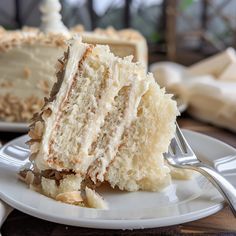 a piece of cake on a plate with a fork in front of it and another slice missing