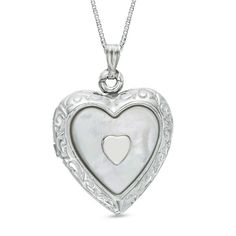 This sterling silver heart locket features mother-of-pearl accents with a polished finish. The locket's 18.0-inch box chain closes with a spring-ring clasp. Pearl Locket, Zales Jewelry, Turquoise Jewelry Native American, Silver Locket, Jewelry Lockets, Pearl Heart, Jewelry Bracelets Silver, Heart Pendant Diamond, Silver Lockets