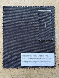 the back side of a pair of blue jeans with a label on it that says pacific blue mills ssn - 213