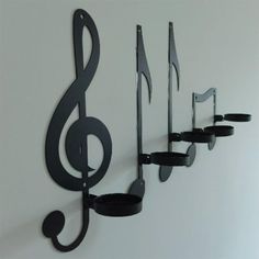 there are musical notes hanging on the wall