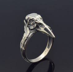 Oxidized Silver Raven Norse Ring, Crow Bird Skull Ring, Crow Ring. ArmenianJewelryHouse personnel do everything to complete the customer's safety and experience.  Item Details  - Material: 925 Sterling Silver - Weight ~ 7.00 Grams(Depending on size) - Gender: Male / Female - Finish: Oxidized Silver / Polished Silver - The product is handmade and its weight may vary up to 1.00 grams. - We recommend using the main photo version of the item(If there are any other options). ✔ Shipped in 5-7 Business White Gold Skull Ring As A Gift, White Gold Skull Rings As Gift, White Gold Skull Rings For Gifts, White Gold Skull Ring For Gift, Silver Gothic Rings In Metal, Gift Skull-shaped Hallmarked Rings, Adjustable Silver Gothic Rings, Bird Skull Ring, Nickel-free Skull Rings For Gift