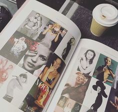 an open magazine with pictures on it and a cup of coffee next to the book