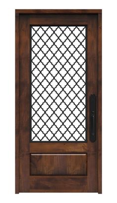 a wooden door with a decorative screen on the side