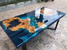 a glass table that is sitting on the ground