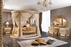 a fancy bedroom with gold furniture and chandelier hanging from the ceiling, along with an area rug on the floor