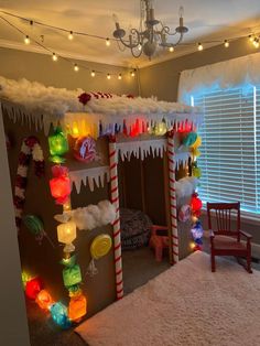 a child's bedroom decorated for christmas with candy canes, lights and decorations