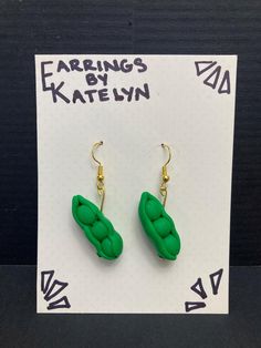 earrings by katelyn are green and gold