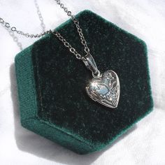 This necklace is 16" long and features a little heart shaped locket pendant. All materials are silver plated and tarnish resistant. Silver Necklace Prom, Heart Locket Necklace Silver, Heart Shaped Locket, Silver Locket Necklace, Heart Locket Necklace, Locket Pendant Necklace, Heart Shaped Necklace, Floral Heart, Silver Lockets