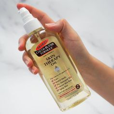 Palmer's Cocoa Butter Formula Skin Therapy Oil is an advanced multi-purpose skin perfection product that can be used all over the body. This preservative-free, lightweight formula contains an exclusive blend of key ingredients such as Vitamin E, Cetesomate-E, Sesame Oil, Canola Oil, and Rosehip Oil, formulated to help improve the appearance of scars, stretch marks, dry, damaged skin, uneven skin tone, aging skin and fine lines and wrinkles. This non-greasy, hypoallergenic, lightweight oil will l Cocoa Butter Formula Skin Therapy Oil, Skin Therapy Oil, Bright Summer Acrylic Nails, Palmer's Cocoa Butter, Skin Perfection, Moisturizing Body Oil, Palmers Cocoa Butter, Cocoa Butter Formula, Dry Itchy Skin