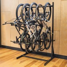 freestanding 5 bike rack Bike Organization, Bike Repair Stand, Vertical Bike Storage, Bike Storage Garage, Bike Storage Solutions, Bike Storage Rack, Vertical Bike, Bicycle Sport, Installing Siding