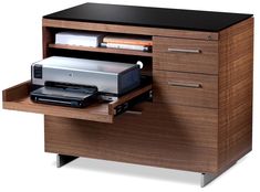 a computer desk with drawers and a printer