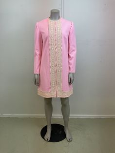 Women's Vintage 1960's Mod Shift Dress. Pastel pink with ric-rack details. Crazy cute! Fits about a modern Medium, in great vintage condition. Zipper back, long sleeves, adorable! Measured flat and in inches. Double where needed or compare to a dress that fits you well. Pit to pit - 19 in Waist - 18.5 in Hips - 20.5 in Length shoulder to hem - 36 in Vintage Pink A-line Dress, Pink Mini Vintage Dress For Spring, Retro Pink A-line Dress, Vintage Pink Mini Length Dress, Vintage Knee-length Pink Dress, Vintage Pink Knee-length Dress, Pink Mod Dress For Spring, Pink Vintage Knee-length Dress, Fitted Pink Vintage Dress For Spring