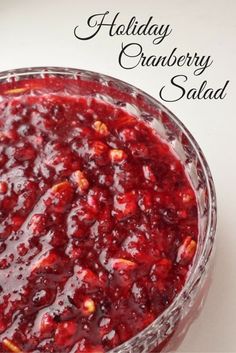 cranberry sauce in a glass bowl with the words holiday cranberry salad