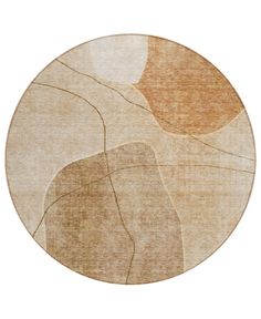 a round rug with an abstract design on the top and bottom, in beige tones