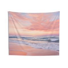 an ocean scene with waves crashing on the shore and pink clouds in the sky above