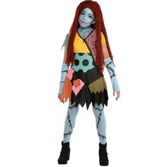 a child's zombie costume with long red hair and blue skin, standing in front of a white background