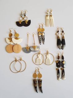 This listing is for ALL 10 pairs. The earrings are 100% handcrafted. **One of a kind made with brass, horn & bones. ^^These earrings ships through dhl express. More earrings; https://www.etsy.com/shop/TribalTess?ref=seller-platform-mcnav&section_id=21293980 Buy multiple items and pay shipping for ONE item ONLY. Polymer Clay African Jewelry, African Clay Earrings, African Bead Earrings, Maasai Earrings, Afro Jewelry, Christmas Gift Earrings, African Inspired Jewelry, Earring Inspo, Horn Earrings