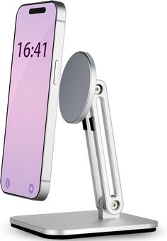 an image of a cell phone on a stand with a magnifying glass in it