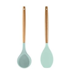 two green spoons with wooden handles on white background